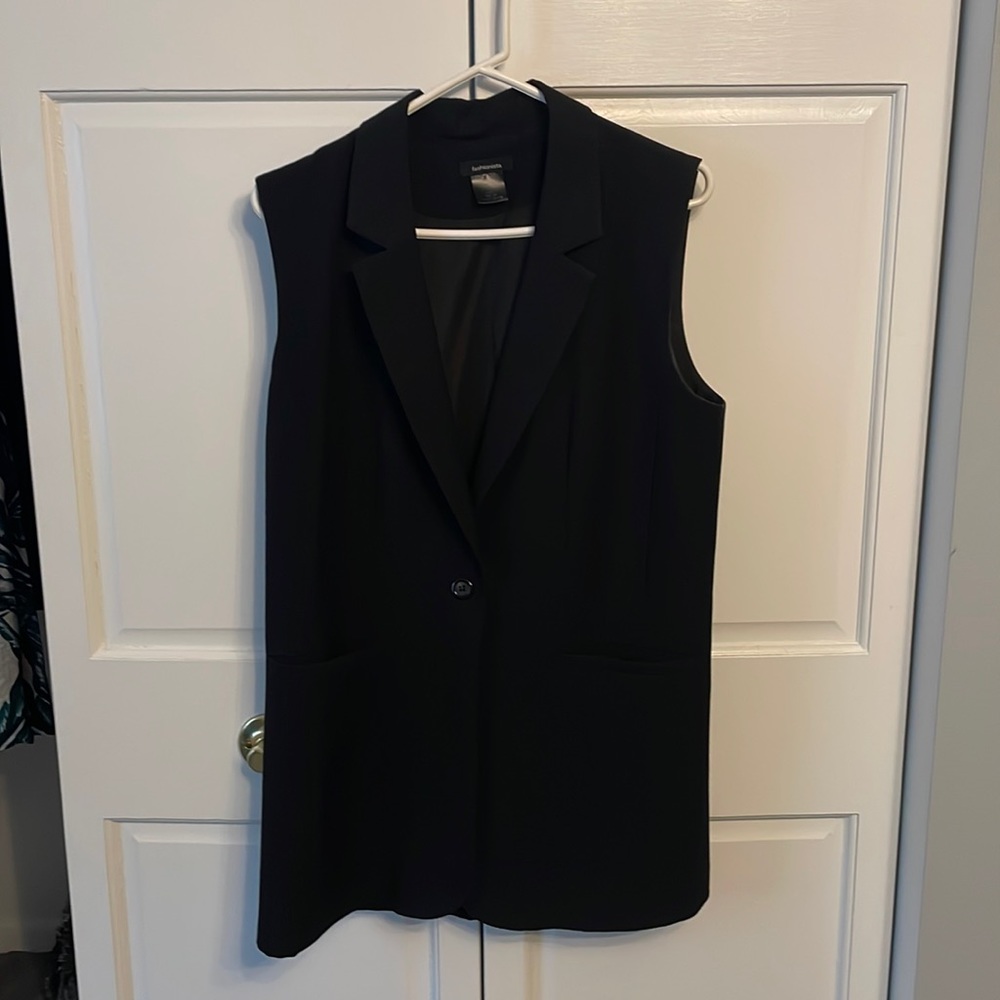 Black blazer vest.
